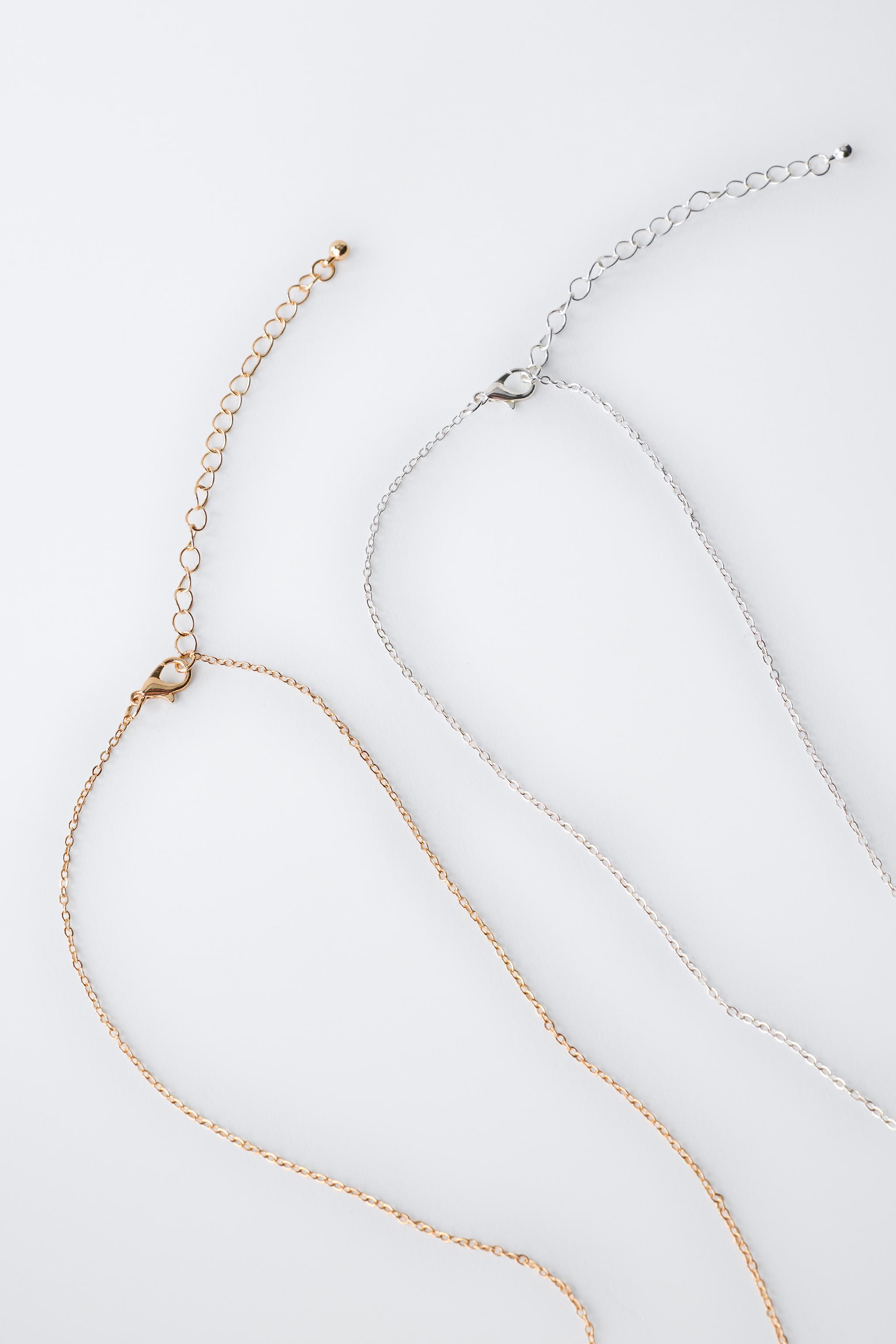 LOT DE DEUX COLLIERS PETITS ANIMAUX
